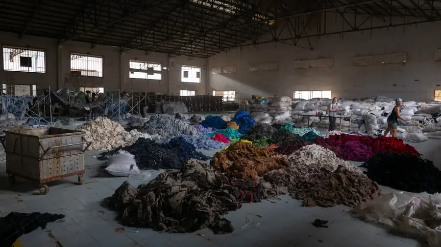 Garment waste and industrial fabric scrap sorted for textile recycling
